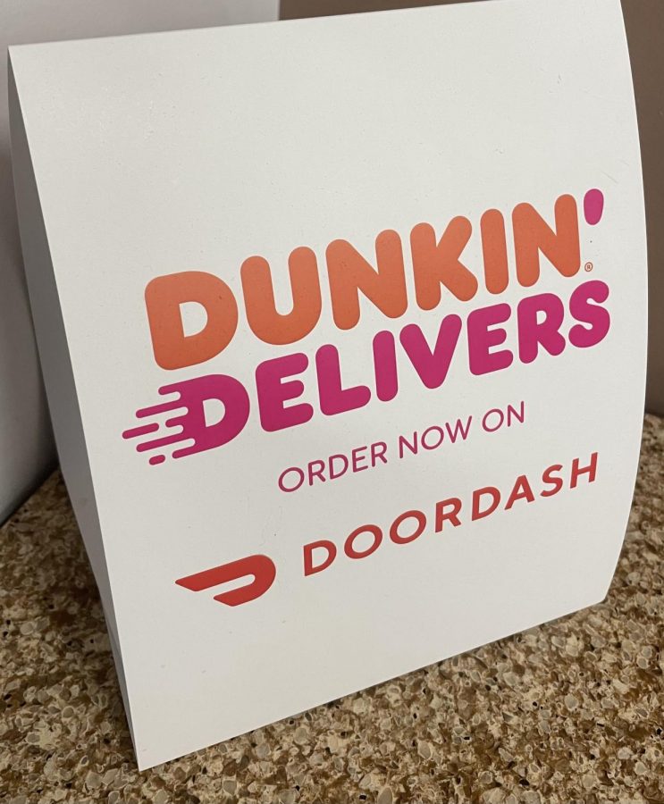 Delivery sign at Dunkin Donuts photographed by Brittany Eldridge.