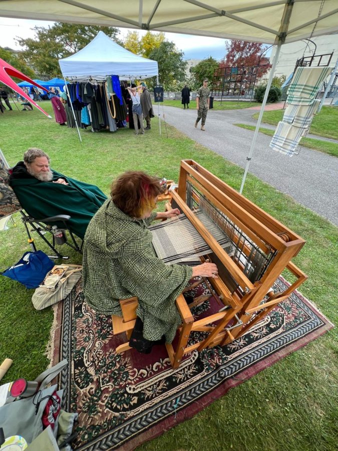 Pat Lipman (Right) weaving on her 43 year old loom
