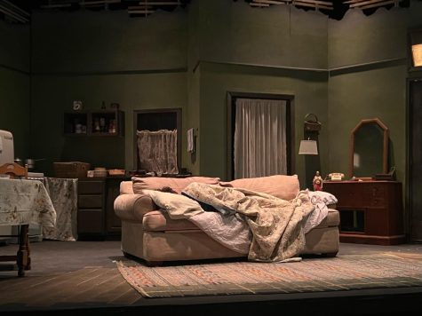 12 year old Dante Gentile (Travis Younger) naps on the set of “A Raisin in the Sun” as guests begin to fill the seats of the auditorium.